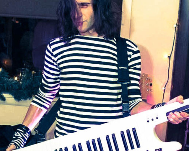 V.J. performing a Roland AX-7 keytar